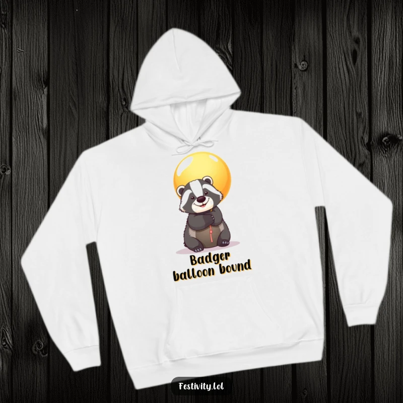 Funny Badger Balloon Hoodie: A smiling badger is hugged by a giant balloon, offering cozy comfort and a dose of heartwarming fun.