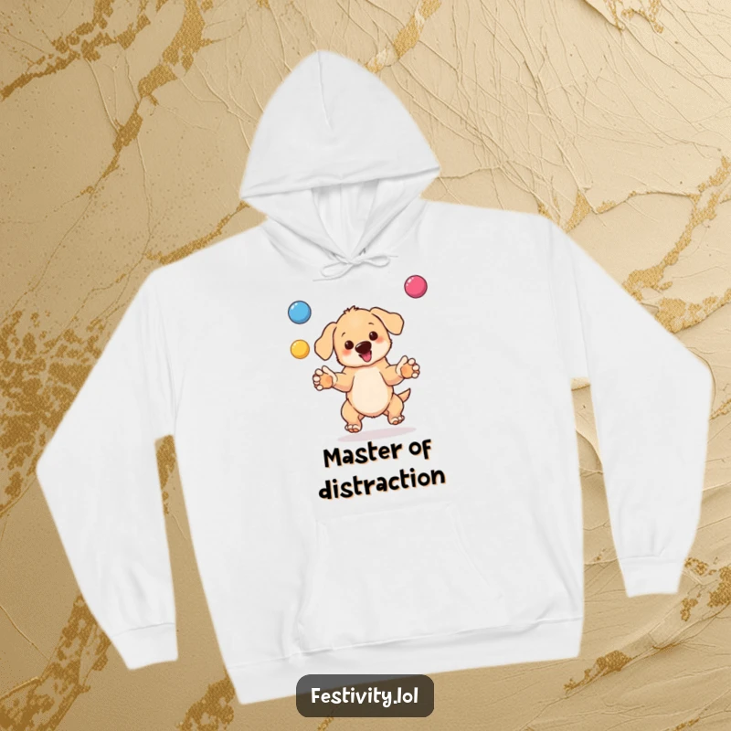Funny hoodie featuring a happy, bouncing puppy juggling multiple colorful balls with its paws, looking focused and fun.