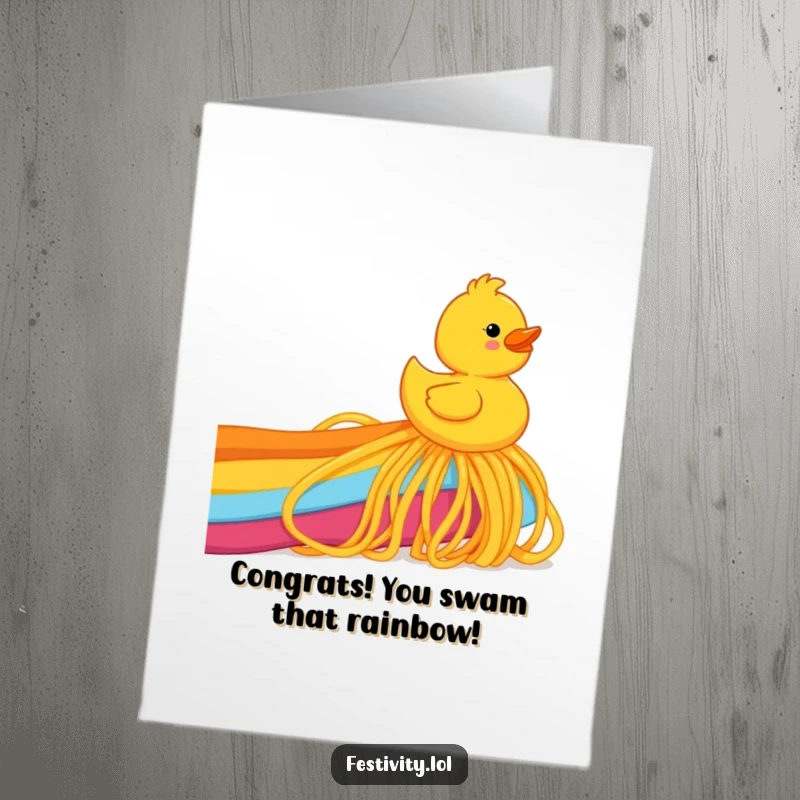 Free Printable Congratulations Card: A happy rubber ducky joyfully slides down a rainbow constructed from spaghetti noodles.