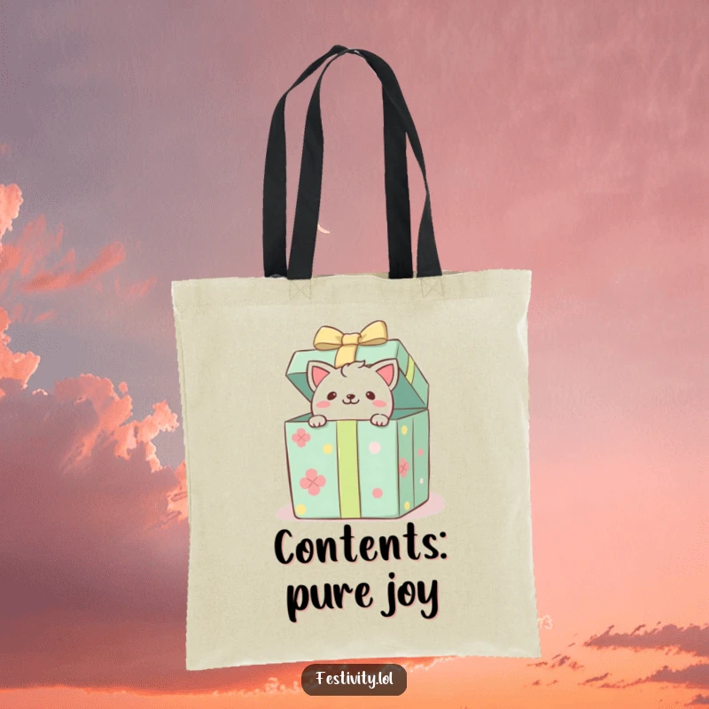 Funny tote bag featuring a playful critter peeking from a gift box, ideal for carrying items with humorous style.